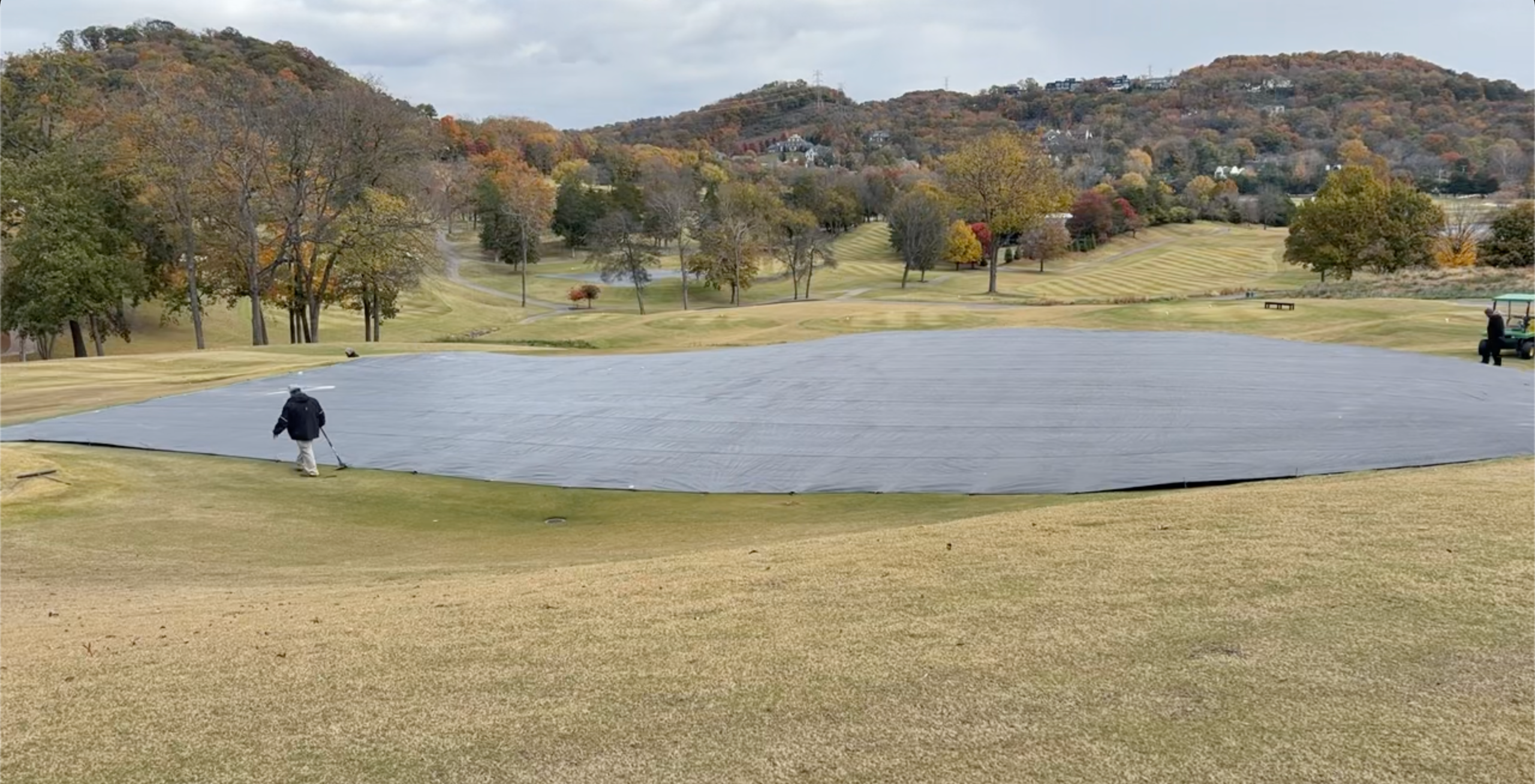 Custom-fitted bermudagrass greens cover installed on golf course putting green